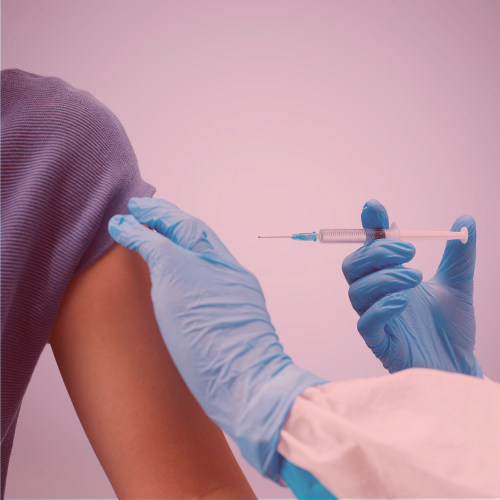 Health professional providing a vaccination