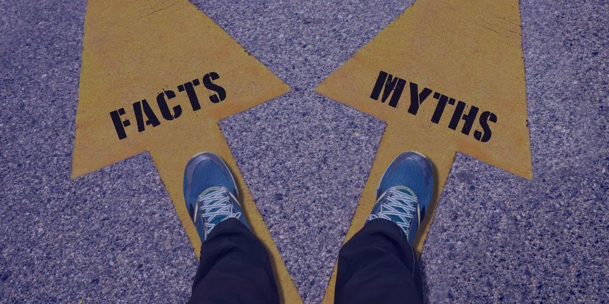 A person standing at a crossroads choosing between two yellow arrows labeled "FACTS" and "MYTHS," symbolizing the choice between truth and misconception.
