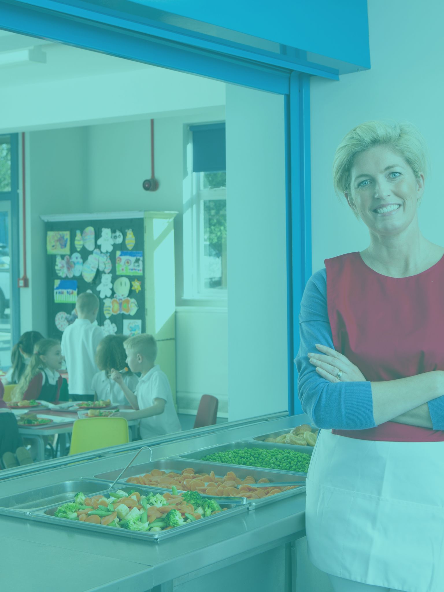 a school canteen serving health food and children sat eating