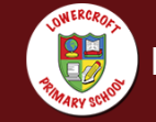 logo of Lowercroft primary school in red with shield in white circle on red background