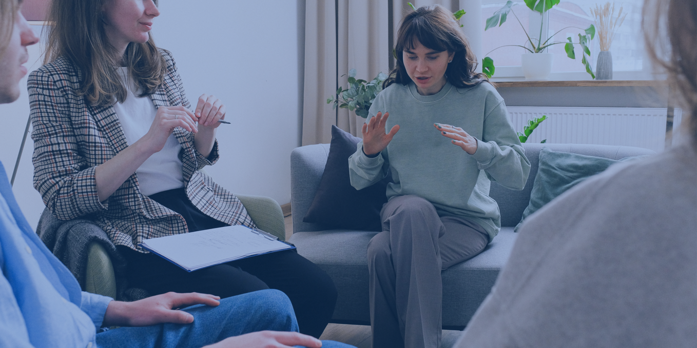 Support group with girl talking