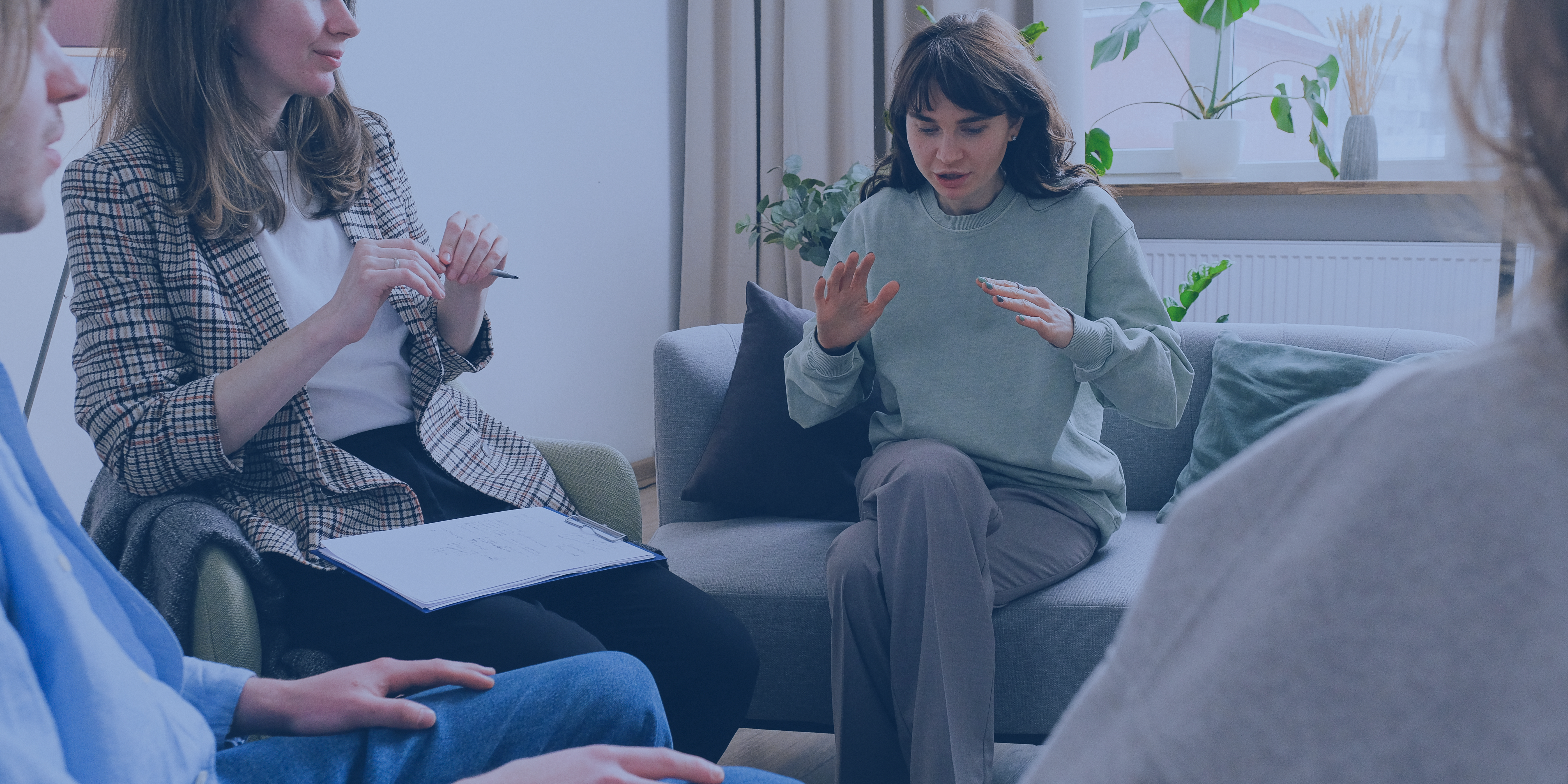 Support group with woman talking